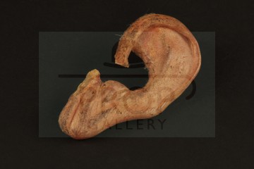 Billy the Kid (Emilio Estevez) prosthetic ear