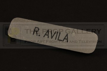 Raymond Avilla (Andy Garcia) name badge