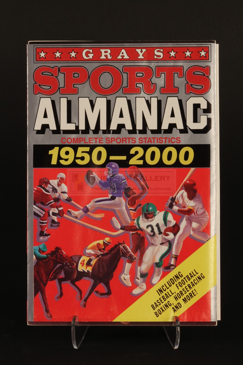 The Prop Gallery Oh LaLa magazine & Grays Sports Almanac dust jacket