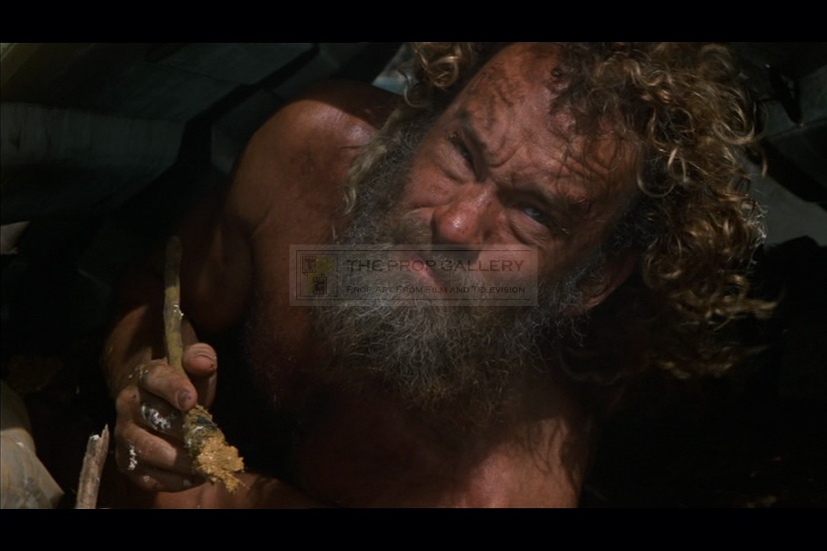 Hanks' performance wins hearts and the dread of ending up alone on an island makes us. The Prop Gallery | Chuck Noland (Tom Hanks) paint brush