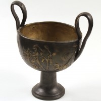 Alexander (Colin Farrell) drinking goblet