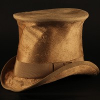 Albert Blossom (Richard Attenborough) top hat
