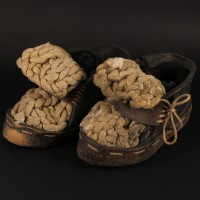 Pod Clock (Jim Broadbent) boots