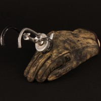 Major Charles Rane (William Devane) prosthetic hook