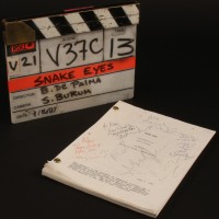 Production used clapperboard & signed script