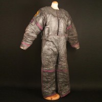 Smith (Sean Pertwee) spacesuit