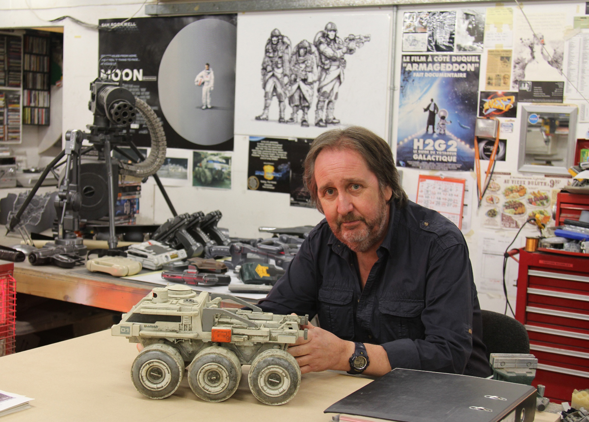 Bill Pearson with The Prop Gallery's original screen used rover filming miniature from Moon