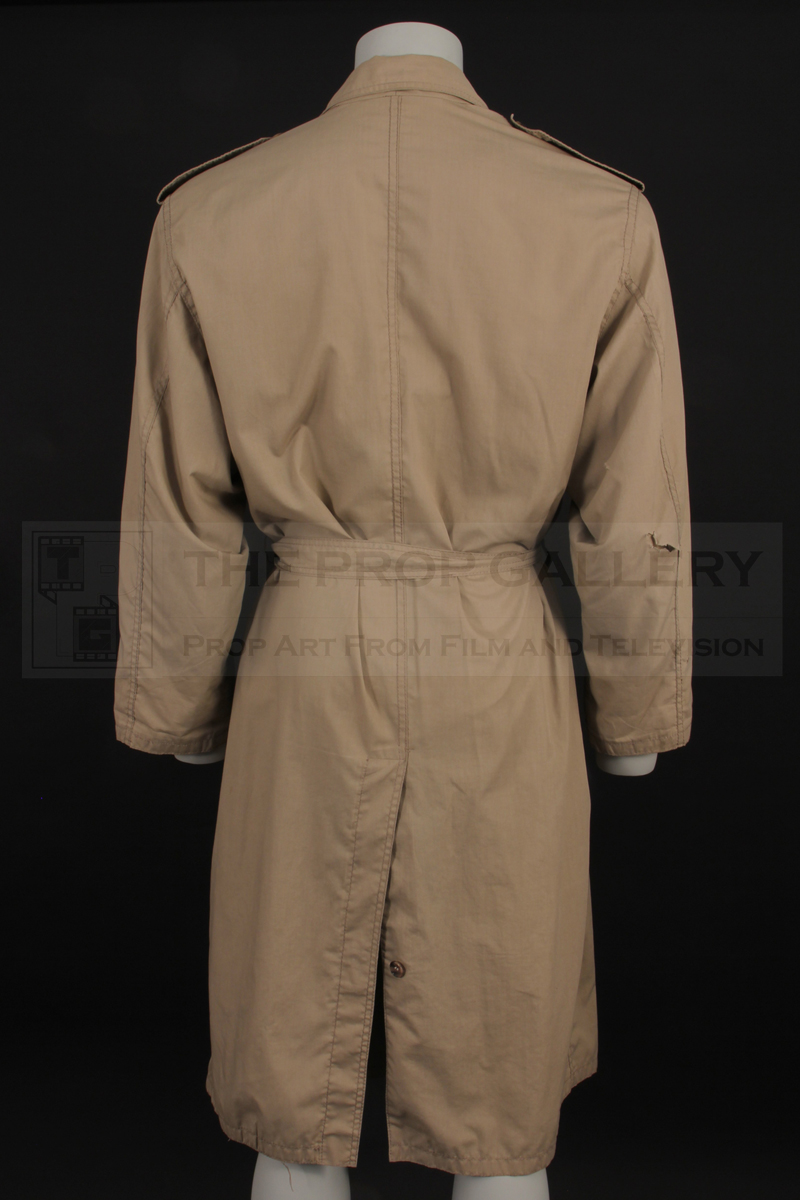 An original trench coat worn on screen by Christopher Lambert as Connor MacLeod in Highlander (1986)