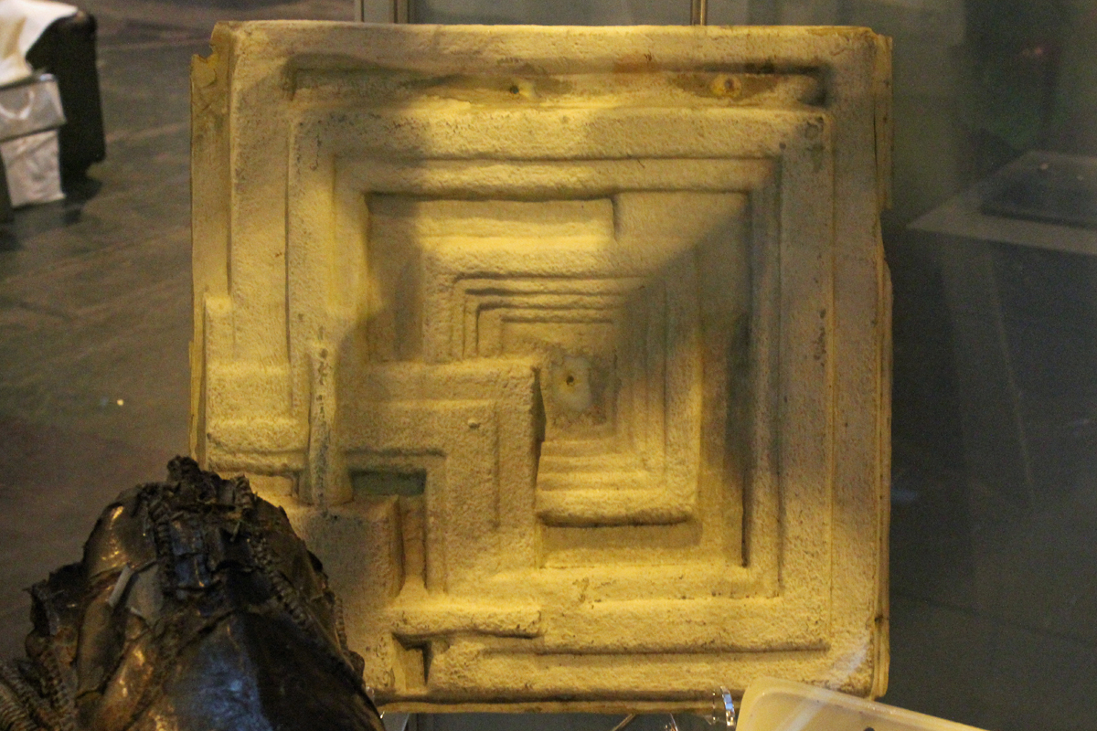 The Prop Gallery exhibit original tile from Rick Deckard's (Harrison Ford) apartment in Blade Runner.