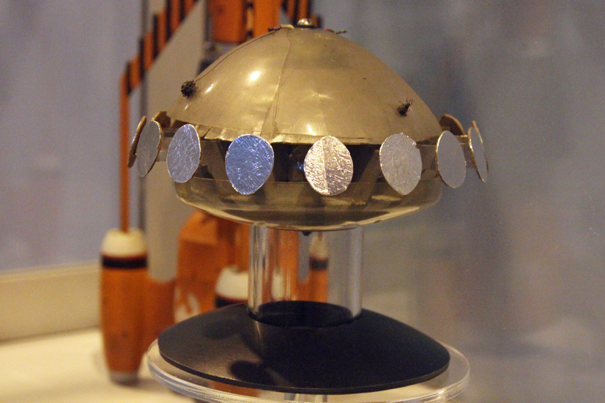 The Prop Gallery exhibit original saucer filming miniature designed by Derek Meddings from Gerry Anderson's UFO.