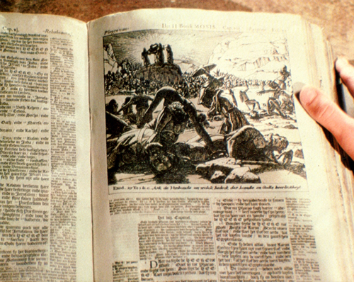 The bible containing the cropped illustration which is not used on screen
