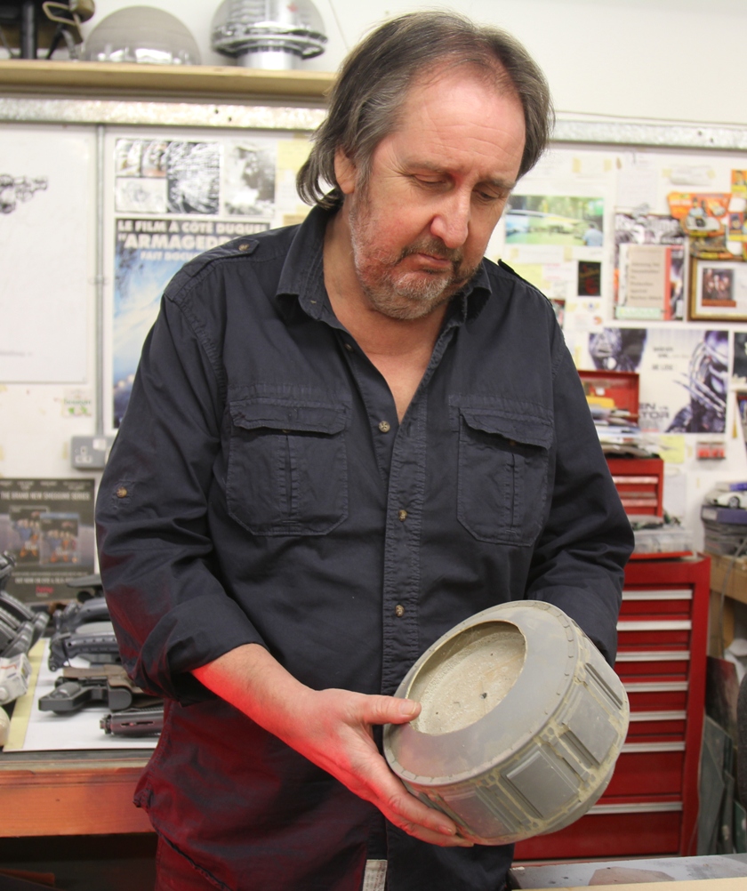 Bill Pearson with an original large scale rover wheel from Moon